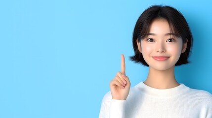 An Asian beauty model gesturing against an isolated background, perfect for a business or commercial wallpaper with blank space for writing.