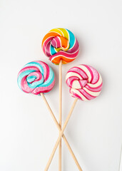 Color lollipop, spiral candy on stick, colorful striped lollypop, round fruit caramel, circle lollipop