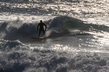 surfers on the beach