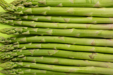 Fresh asparagus as background, top view