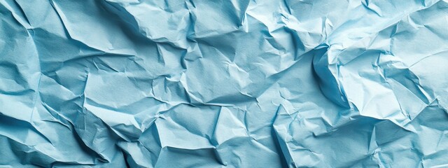 Fototapeta premium Background with texture of the rumpled blue office paper.