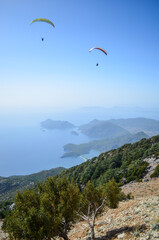 paraglider over the mountains, fethiye oludeniz