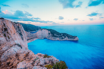Fototapeta premium Zakynthos, Greece. Navagio Beach with wrecked ship in Ionian Sea. Beautiful views of azure sea water and nature with cliffs cave.