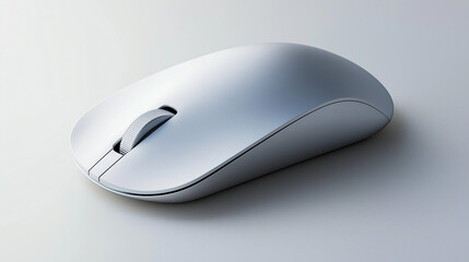 Modern wireless mouse resting on white desk