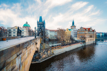 Obraz premium View of the city of Prague and the Vltava river with Old Town Bridge Tower on Charles bridge in Prague, Czech Republic.