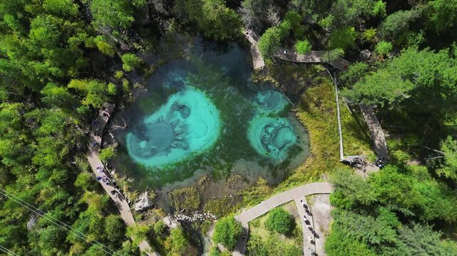 Landscape Altai melancholic mood, blue geyser lake, mountains Altay Russia Aerial drone view.