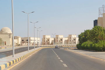 Transportation and traffic on highway in Hurghada city. City with street cars