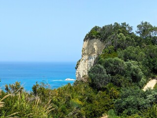 Beautiful view over Cape Drastis on the island of Corfu in Greece on a sunny summer's day with turquoise blue water