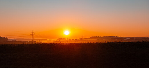 Foggy summer sunrise near Untereschlbach, Eggenfelden, Rottal-Inn, Bavaria, Germany