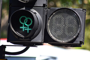 LGBTQ+ symbols on pedestrian traffic light