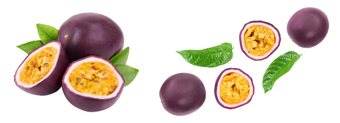 whole passion fruits and a half with leaves isolated on white background. Isolated maracuya