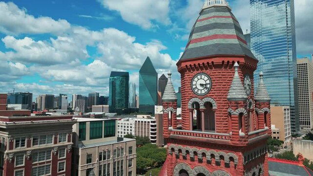 Reveal of Dallas Texas Skyline from Behind Clock Tower