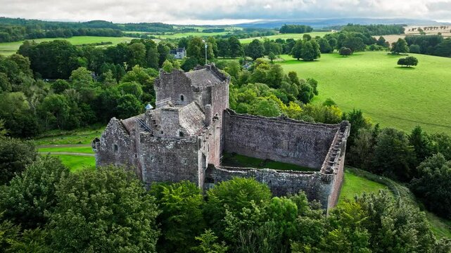 Aerial view of a Medieval Castle with a high gatehouse in Scotland. Fortress gatehouse Doune Castle, a film location in a number of popular productions in Isle of Skye.