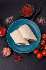 Delicious traditional shawarma or doner kebab with beef, mushrooms