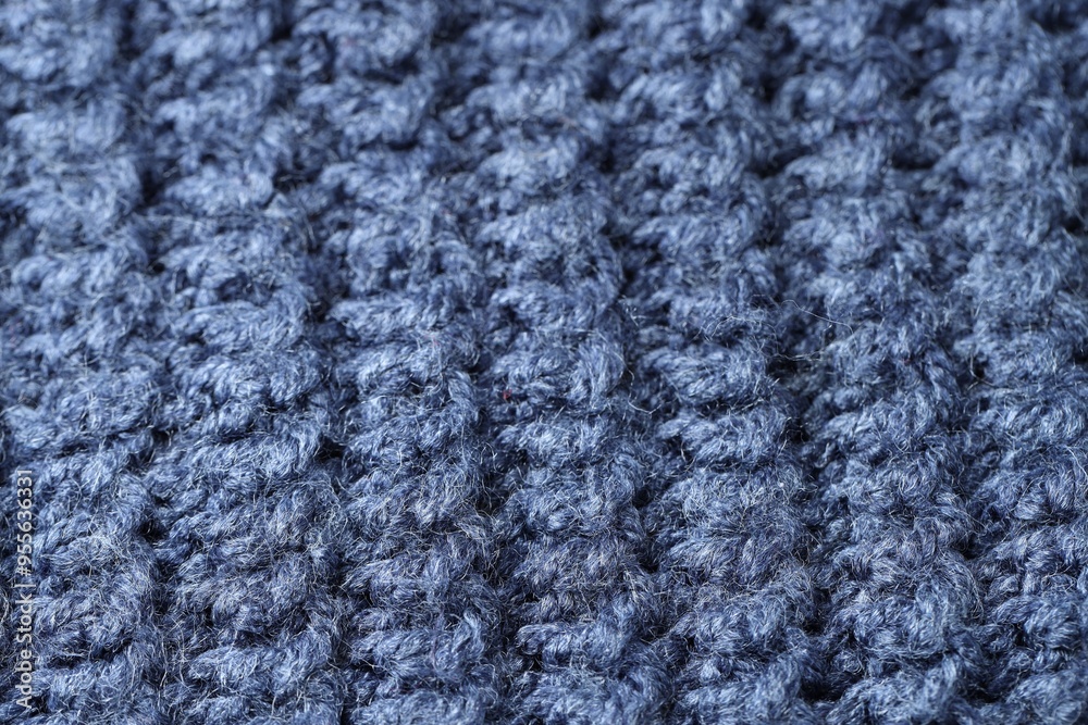 Canvas Prints Texture of blue knitted fabric as background, closeup