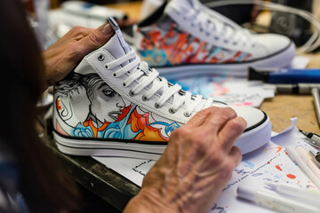 Custom Sneaker Design, Artists hand-painting and customizing sneakers with unique designs