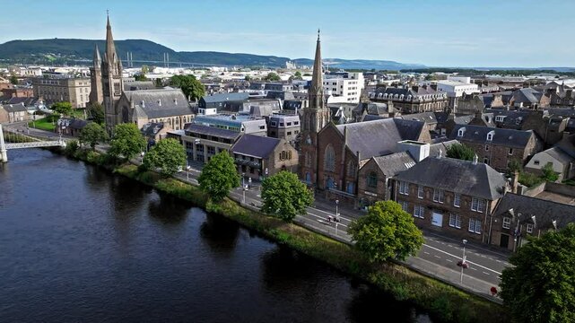 Aerial view of Old High Church and cemetery in Inverness city in the Scottish Highlands. Drone view of Old Town on Scotland&rsquo;s northeast coast, where the River Ness meets the Moray Firth, United Kingdo