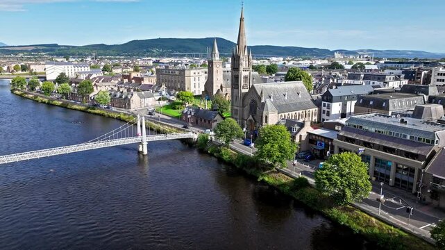 Aerial view of Old High Church and cemetery in Inverness city in the Scottish Highlands. Drone view of Old Town on Scotland&rsquo;s northeast coast, where the River Ness meets the Moray Firth, United Kingdo