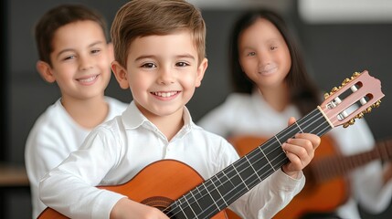 A cheerful boy plays the guitar happily among friends, his smile brightening the festive atmosphere created by warm natural light and soft shadows.