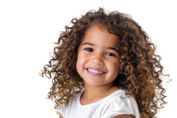 Happy Brazilian brunette girl with curly hair smiling on white background.