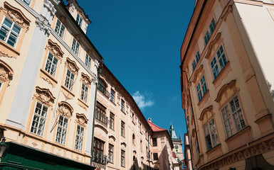 Low angle view buildings against blue sky