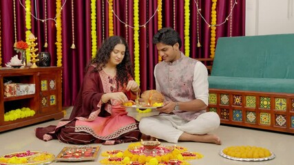 Indian Couple Arranging Pooja Thali for Diwali Festival