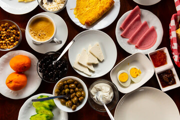 Traditional Turkish breakfast: egg, vegetables, cheeses, olives and ham. Halal breakfast