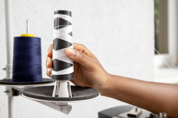 Thread spools for sewing machine in textile industry