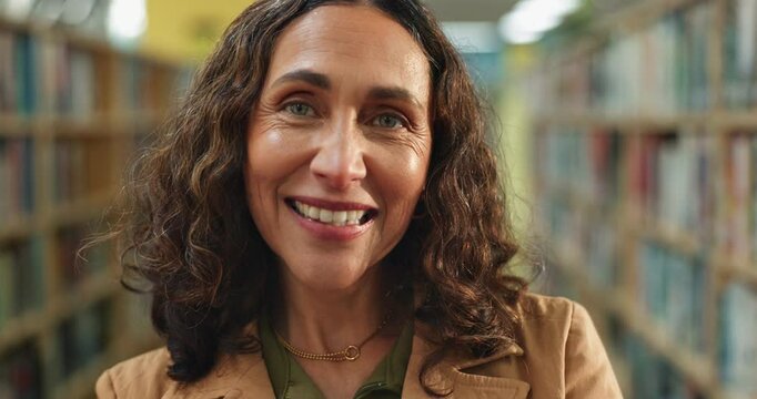 Happy woman, library and publisher with bookshelf in confidence for publishing career, knowledge or literature. Portrait of female person, author or librarian with smile for storytelling at bookstore