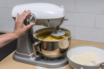 Kitchen planetary mixer for dough making.