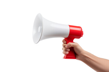 A person stands holding a red and white megaphone, ready to amplify their voice in a public setting.
