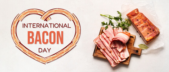 Wooden board with slices of tasty smoked bacon on light background