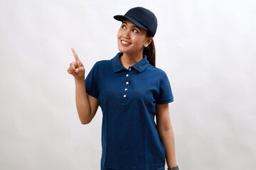 Young asian woman courier wearing delivery uniform and cap showing and pointing up with finger number one while smiling confident and happy.