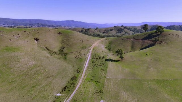 Flying over rolling hills at Acheron Lookout