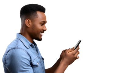 Handsome, smiling young black African-American man viewed from the side looking at his phone portrait, isolated on transparent background DEI DEIB