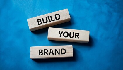Wooden blocks with words 'Build Your Brand'.
