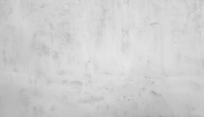 Large white grunge textured concrete wall background. The backdrop is a rough cement floor in gray and white tones.
