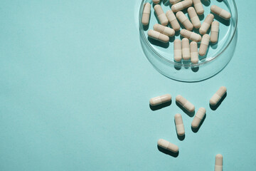 medicine capsules pills in a petri dish, supplements vitamins, Assorted pharmaceutical medicine