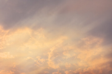Fototapeta premium clouds at sunset illuminated by the sun's rays