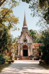 Naklejka premium Ancient Temple Entrance With Lush Greenery and Pathway