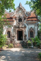 Fototapeta premium Ancient Temple Entrance with Stone Steps and Ornate Carvings