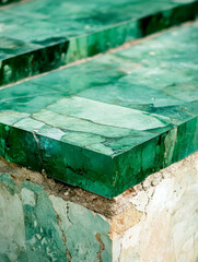 Close-up view of vibrant green jade stone showcasing its unique patterns and textures, perfect for decorative purposes.