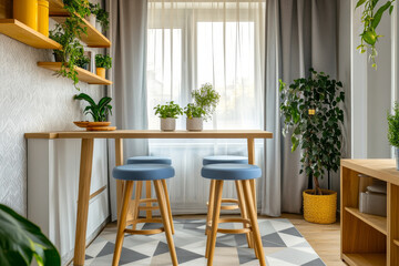Obraz premium Modern kitchen interior with bar table, colorful wooden stools, grey wallpaper, plants, and geometric carpet near window with light curtains.