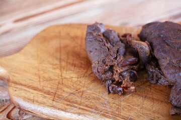 Braised beef on a cutting board