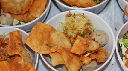 Bakso Malang, meatball soup from Malang, East Java served with noodles, tofu, and fried pangsit or dumplings