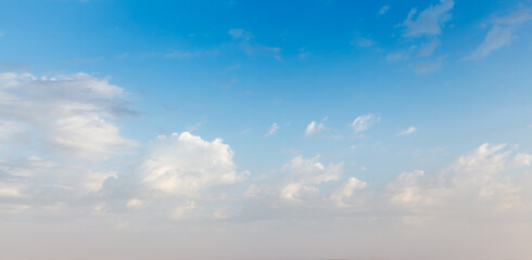 Peaceful and serene sky with clouds on sunset background