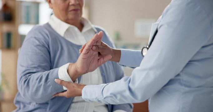 Elderly woman, physio or pain in wrist with stretch for check, medical diagnosis or assessment in office. Senior care, person or specialist in clinic with consultation for arthritis relief in hand