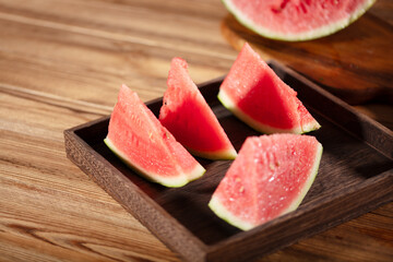 Summer watermelon cut open on table