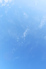 beautiful blue sky and white fluffy group of clouds with sunrise in the morning, natural background