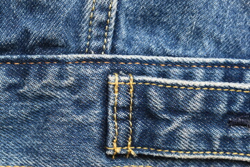 seam of blue denim texture background, jean fashion style